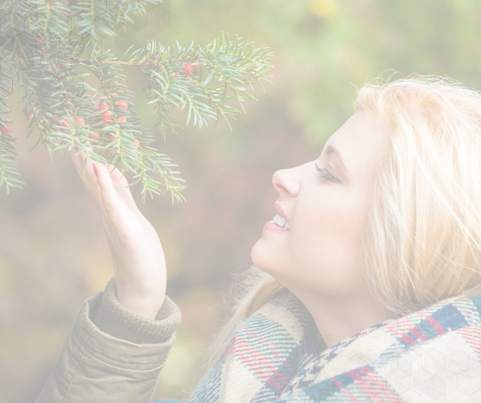woman with Christmas greenery