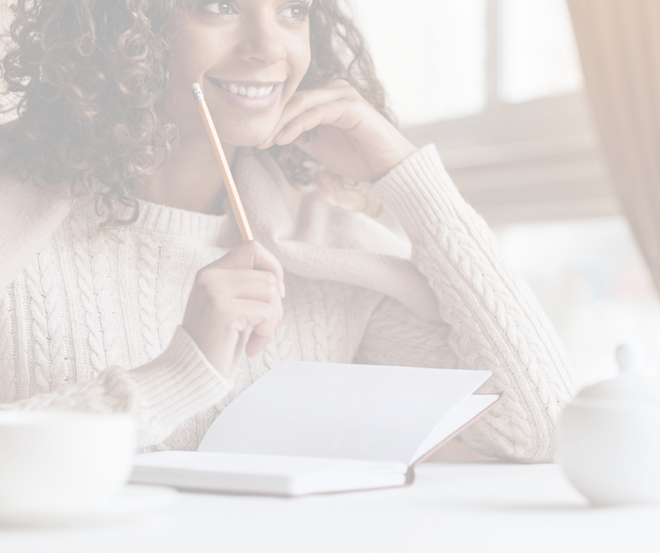 young woman smiling ready to write in fresh new journal